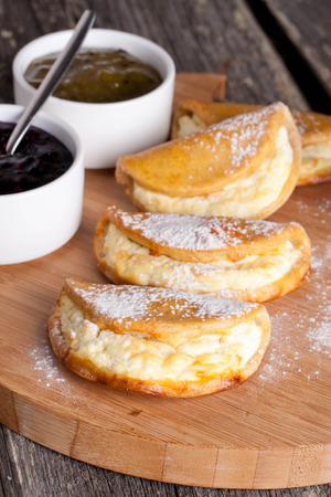 Buns with cottage cheese, vertical, close upの写真素材
