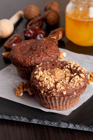 chocolate muffins with nutsの写真素材