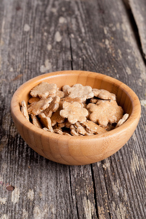 Bowl of salty crackers, close up. verticalの写真素材