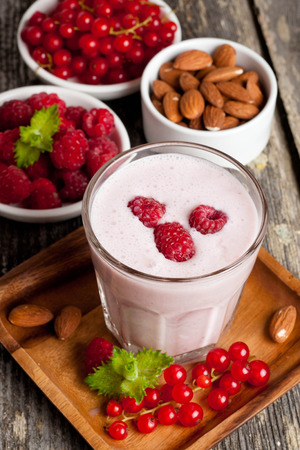 healthy berry smoothies with oatmeal, vertical, top viewの写真素材