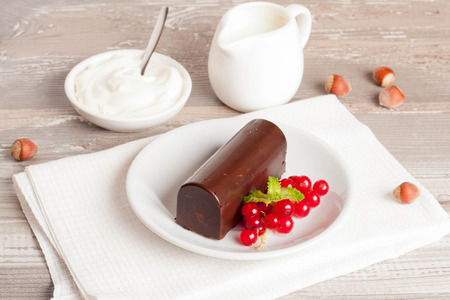 glazed cheese curds with chocolate and fresh currant . sweet breakfast. close-up.selective focusの写真素材