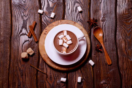 hot chocolate with marshmallows and spice, top view, close up, horizontalの写真素材