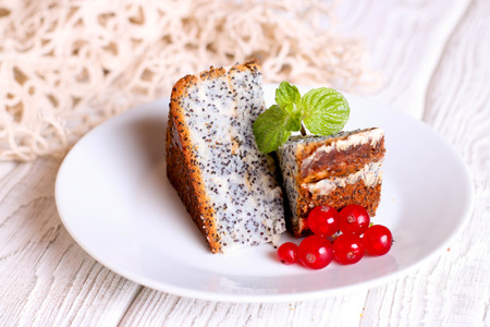 Dessert - Poppy Seed Cake with red currant and Mint, close up, horizontalの写真素材