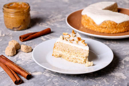 Cake with peanuts on a plate, close up, horizontal
