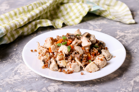 Buckwheat porridge with mushrooms and chicken, close up, horizontalの写真素材