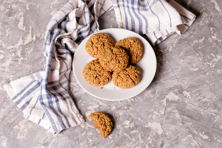 Oatmeal cookies on a wooden desk, close up, horizontal, top viewの写真素材