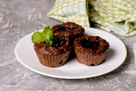 Chocolate muffins with crispy top, close up, horizontalの写真素材