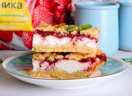 Stack of cake or cookies with plum, strawberry, raspberry and cherry jam or marmalade with sweet crumbs, close up, horizontalの写真素材