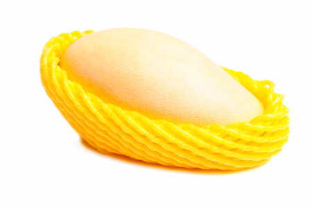 Ripe yellow mango in a grid isolated on a white background.