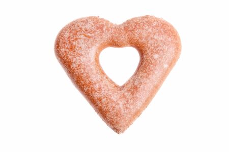 Heart shaped gingerbread isolated on a white background.の写真素材