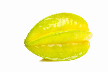 Ripe yellow-green carambola isolated on a white background.の写真素材