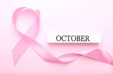 Pink ribbon on a pink background. Breast cancerの写真素材