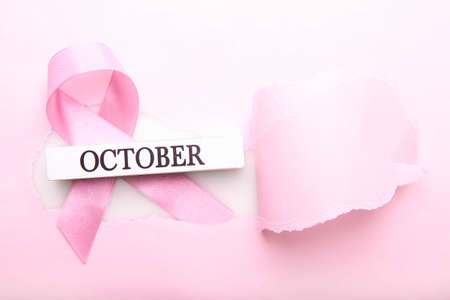 Pink ribbon on a pink background. Breast cancerの写真素材
