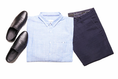Classic shirt, trousers with shoes isolated on white.