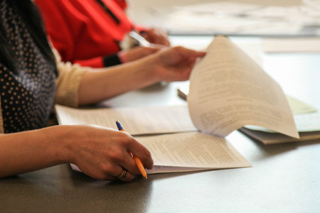 Woman examines documentation. Signing a contract. Business concept