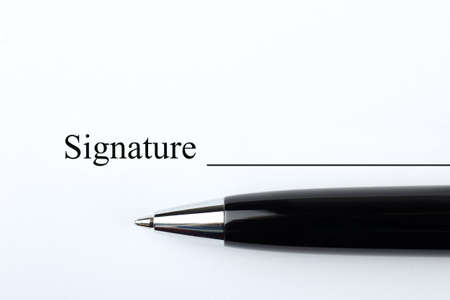 Pen on a sheet of paper. Signing a contract close-up. signature.の写真素材
