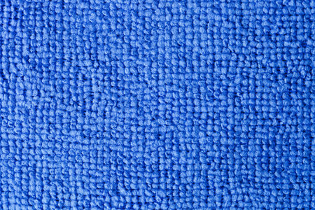 Texture of blue napkin with microfiber for cleaning, close-up.