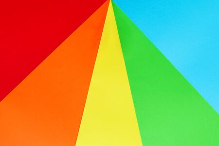 Bright multicolored rainbow paper background. Geometric. Vivid   colors layout. Abstract colourful texture layoutの写真素材