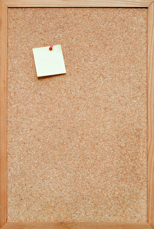 blank cork board / bulletin board with a wooden frameの写真素材