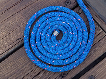 blue boater's rope artistically coiled                           の写真素材