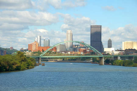 A view from the Hot Metal Bridge walkway of the Birmingham Bridge over the Monongahela River in the city of Pittsburgh の写真素材