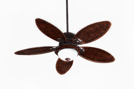 dark brown tropical wicker ceiling fan with light fixtureの写真素材