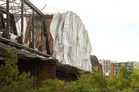 City Bridge with tented covering for maintenance repairs and restorationの写真素材