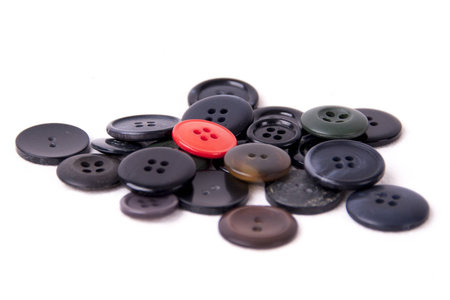 Assorted black and red buttons isolated on white background