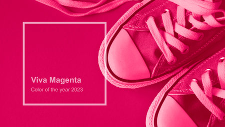 Viva Magenta monochrome sneakers. Trendy color 2023 concept.