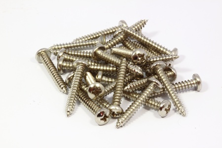Metal screw on white backgroundの写真素材