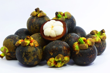 Mangosteen tropical fruit with white backgroundの写真素材