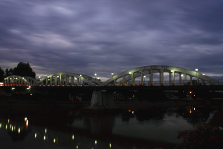 The overcast sky day at the Ratsadaphisak Bridge,Lampang,Thailandの写真素材