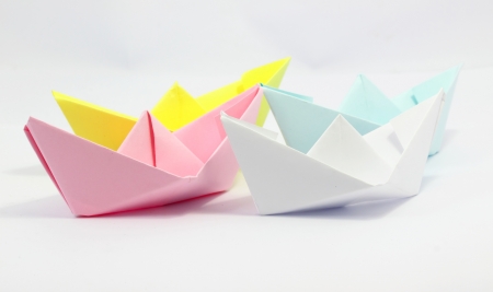 Paper boat with white backgroundの写真素材