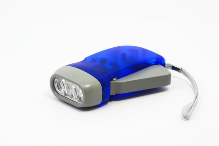 Hand-pressing Flashlight for simply shake to recharge on white backgroundの写真素材