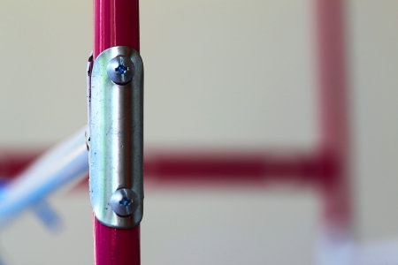 Bolts screw in metal surfaceの写真素材