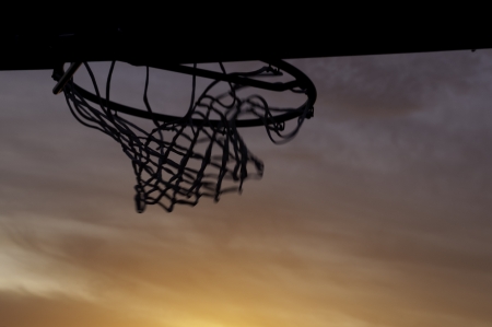 a basketball hoop and net after a shotの写真素材