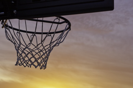 basketball hoop silhouette sunsetの写真素材