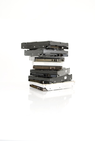 A stack of 3,5 inches hard drives  Isolated on white background の写真素材