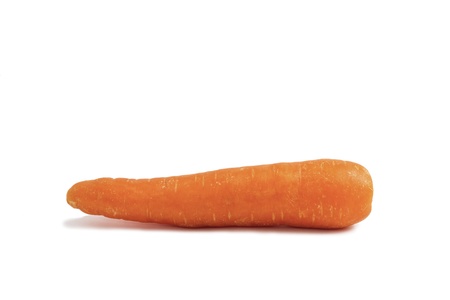 Side view of a raw organic carrot on white background の写真素材