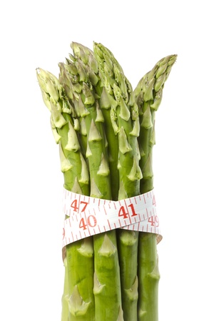 A diet   dieting concept photo  Asparagus with measure tape on の写真素材