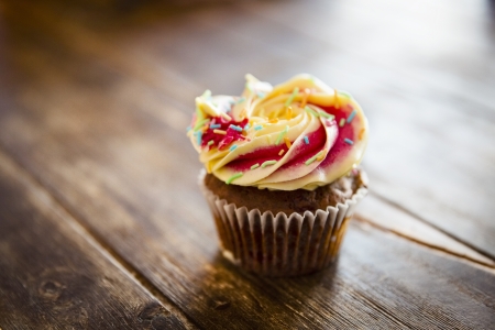 Sweet and tasteful cup cake with chocolate  and spriklesの写真素材