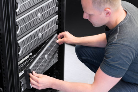It engineer   technician working in a data center  Maintain a hard drives in a SAN の写真素材