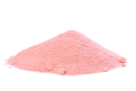 Organic raw powder of pomegranate  Punica granatum  on white background の写真素材