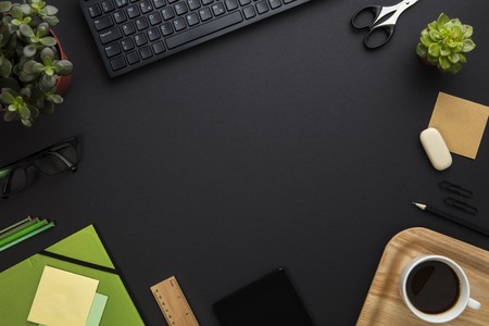 Office Equipment And Computer Keyboard Arranged On Gray Deskの写真素材