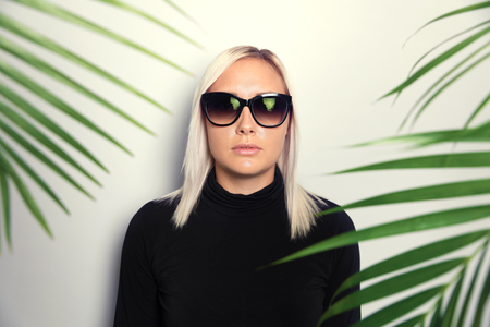 Gorgeous woman dreaming about vacation in tropical environmentの写真素材