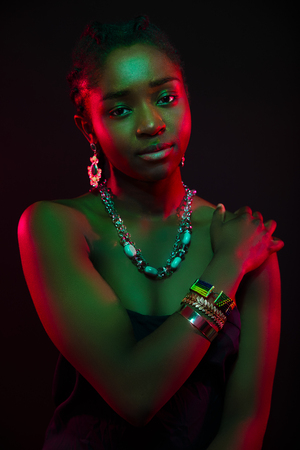 Multi color portrait of confident african woman wearing jewelryの写真素材
