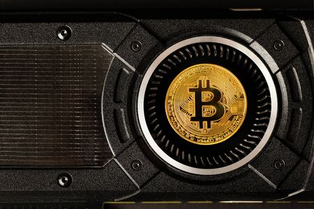 Gold bitcoin on crypto mining GPU computer hardwareの写真素材