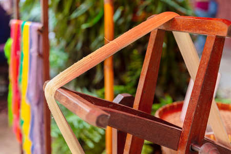 Closeup Of Silk On Wooden Frame At Factoryの写真素材