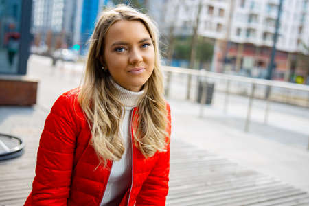 Portrait Of Beautiful Young Blonde Woman In Cityの写真素材