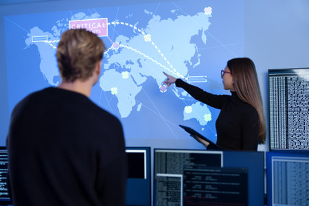 Professional cyber security team working to prevent security threats, find vulnerability and solve incidentsの写真素材